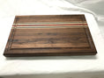Walnut Cutting Board made with exotics. Strips of solid Wenge wood, Maple & African Padauk