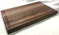 Load image into Gallery viewer, Walnut Cutting Board made with exotics. Strips of solid Wenge wood, Maple & African Padauk
